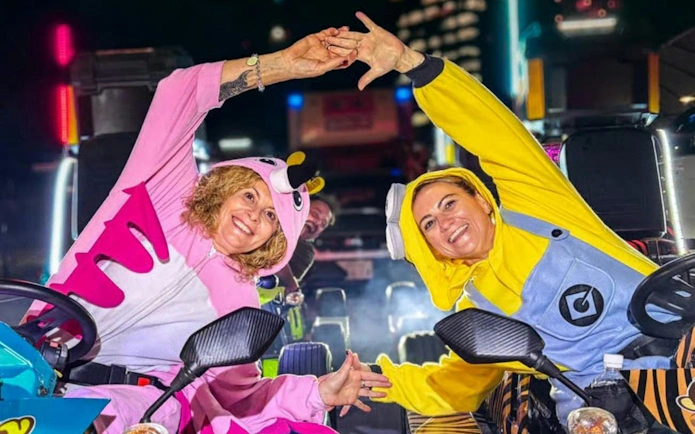 Go-kart riders in costumes enjoying Shibuya Crossing 75-Min Go-Karting Experience by Monkey Kart.