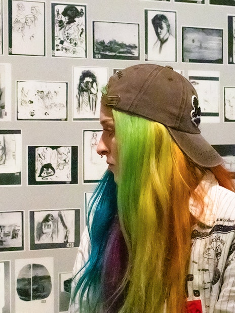 Visitors viewing sketches at Picasso Museum during skip-the-line guided tour.