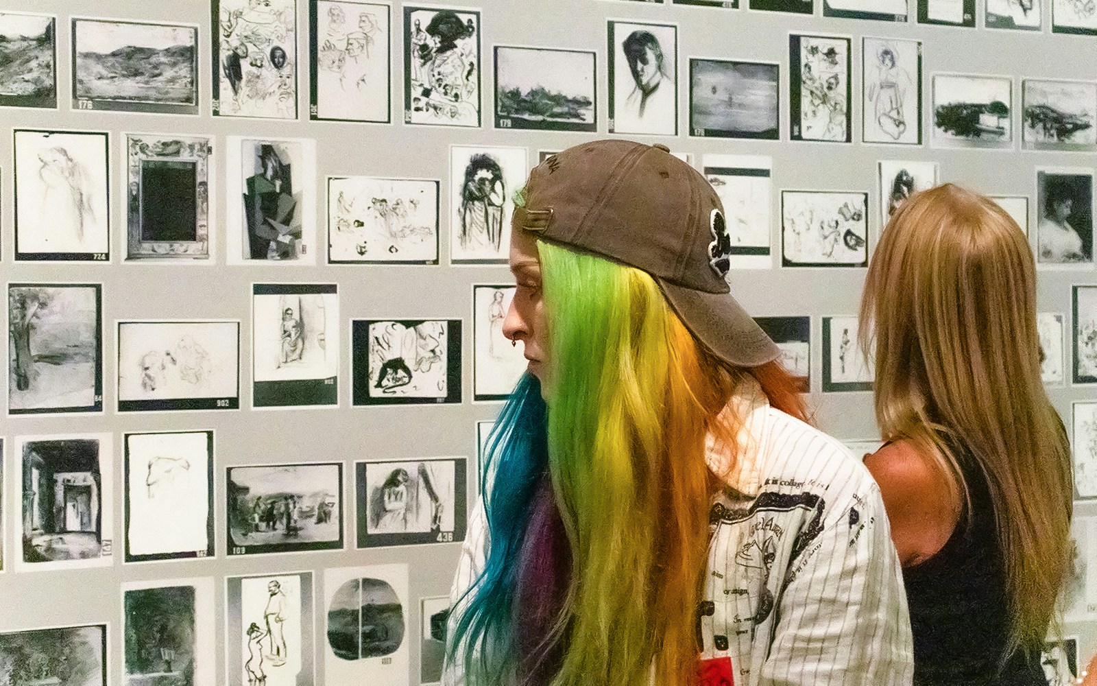 Visitors viewing sketches at Picasso Museum during skip-the-line guided tour.