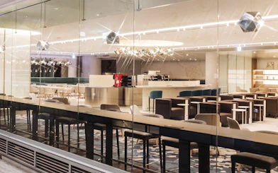 Matina Lounge seating area at Incheon International Airport Terminal 2, featuring modern decor and ample seating.