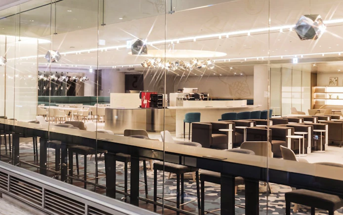 Matina Lounge seating area at Incheon International Airport Terminal 2, featuring modern decor and ample seating.