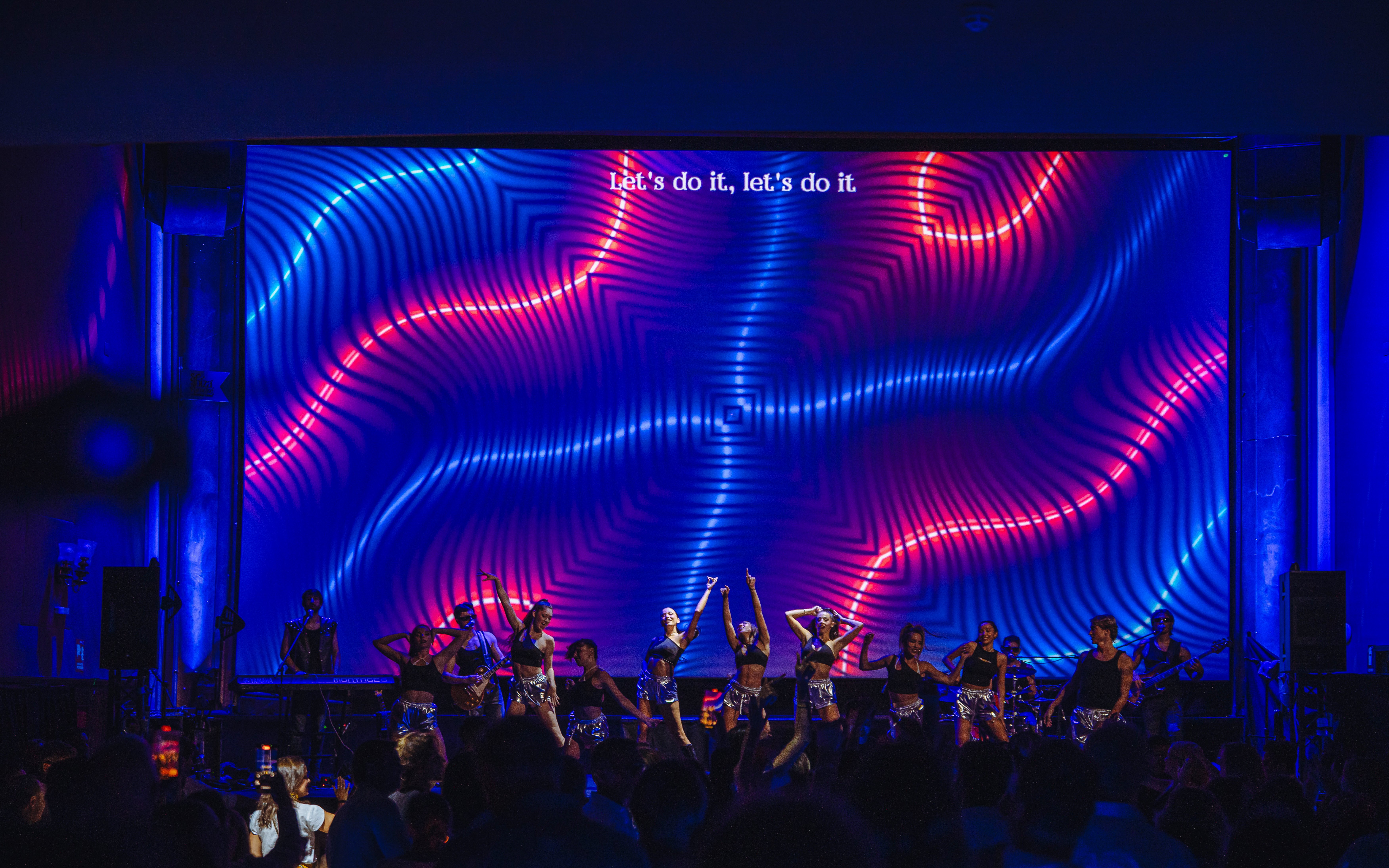 Stage performance with dancers and musicians at Ibiza Paradise by Nacho Cano, Madrid.
