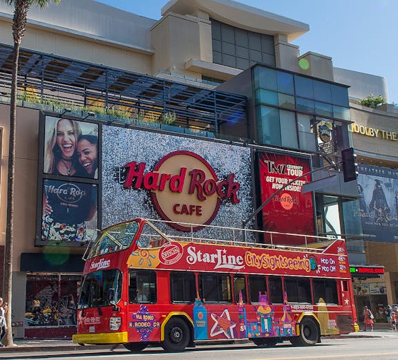 StarLine sightseeing bus in front of Hard Rock Cafe, Hollywood Boulevard, Los Angeles.