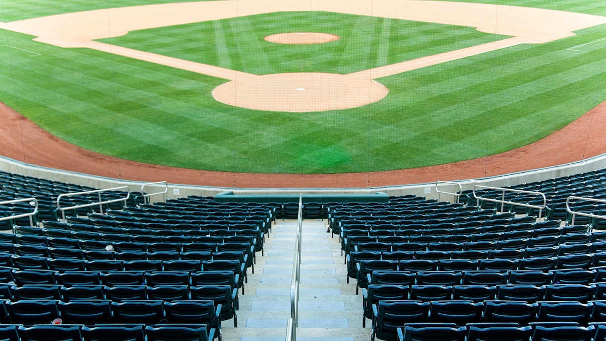 Stadium seating overlooking Fenway Park baseball field.
