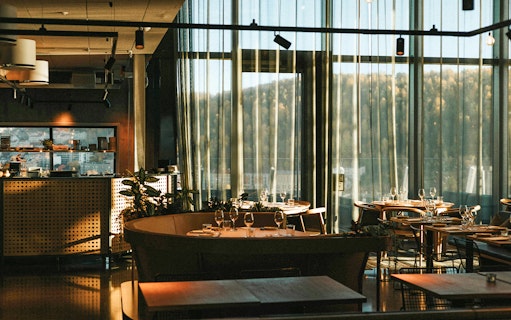 Interior of a restaurant at the Munch Museum with tables set for dining.