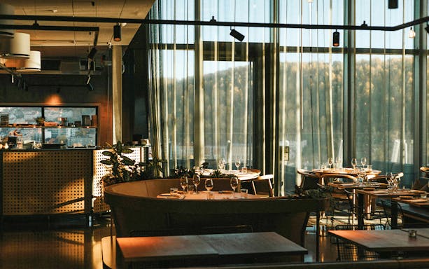 Interior of a restaurant at the Munch Museum with tables set for dining.