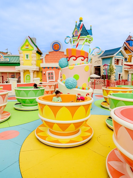 Kids enjoying teacup ride at Energylandia Theme Park, Zator, near Krakow, Poland.