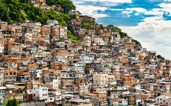 Favela Cantagalo hillside view in Rio de Janeiro, Brazil, with colorful stacked houses.