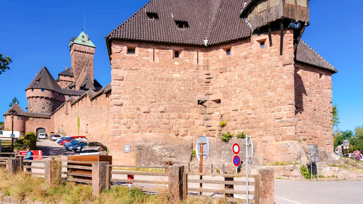 Haut-Koenigsbourg Castle exterior with stone walls and towers in Alsace, France.