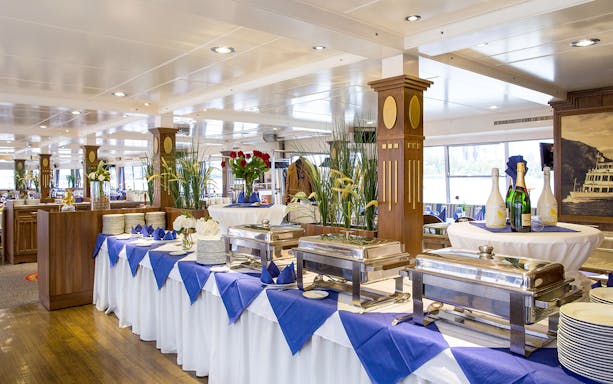 Buffet setup on Danube sightseeing cruise with brunch and live music.