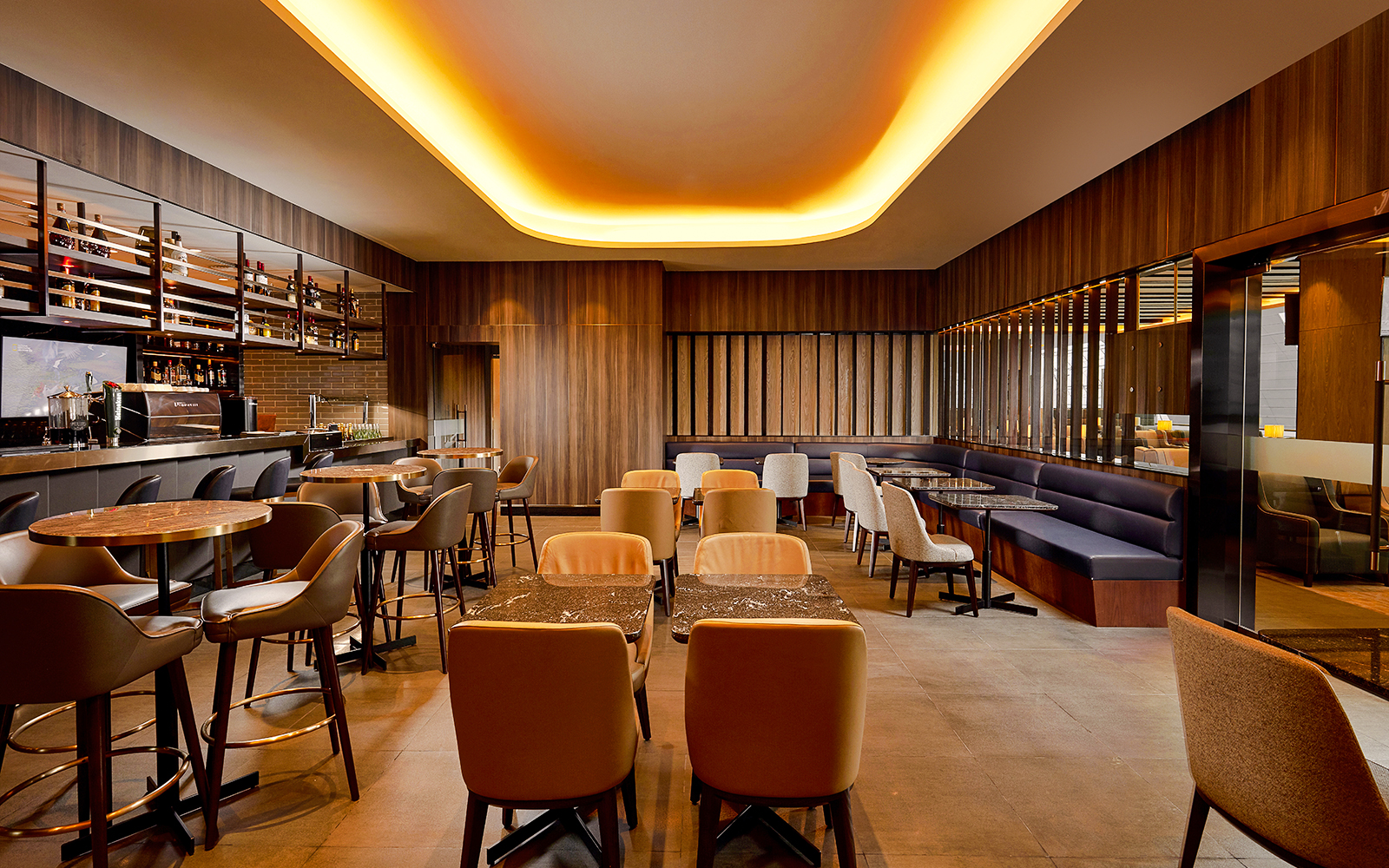 Plaza Premium Lounge seating area at Dubai International Airport.