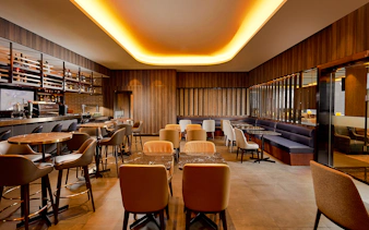 Plaza Premium Lounge seating area at Dubai International Airport.
