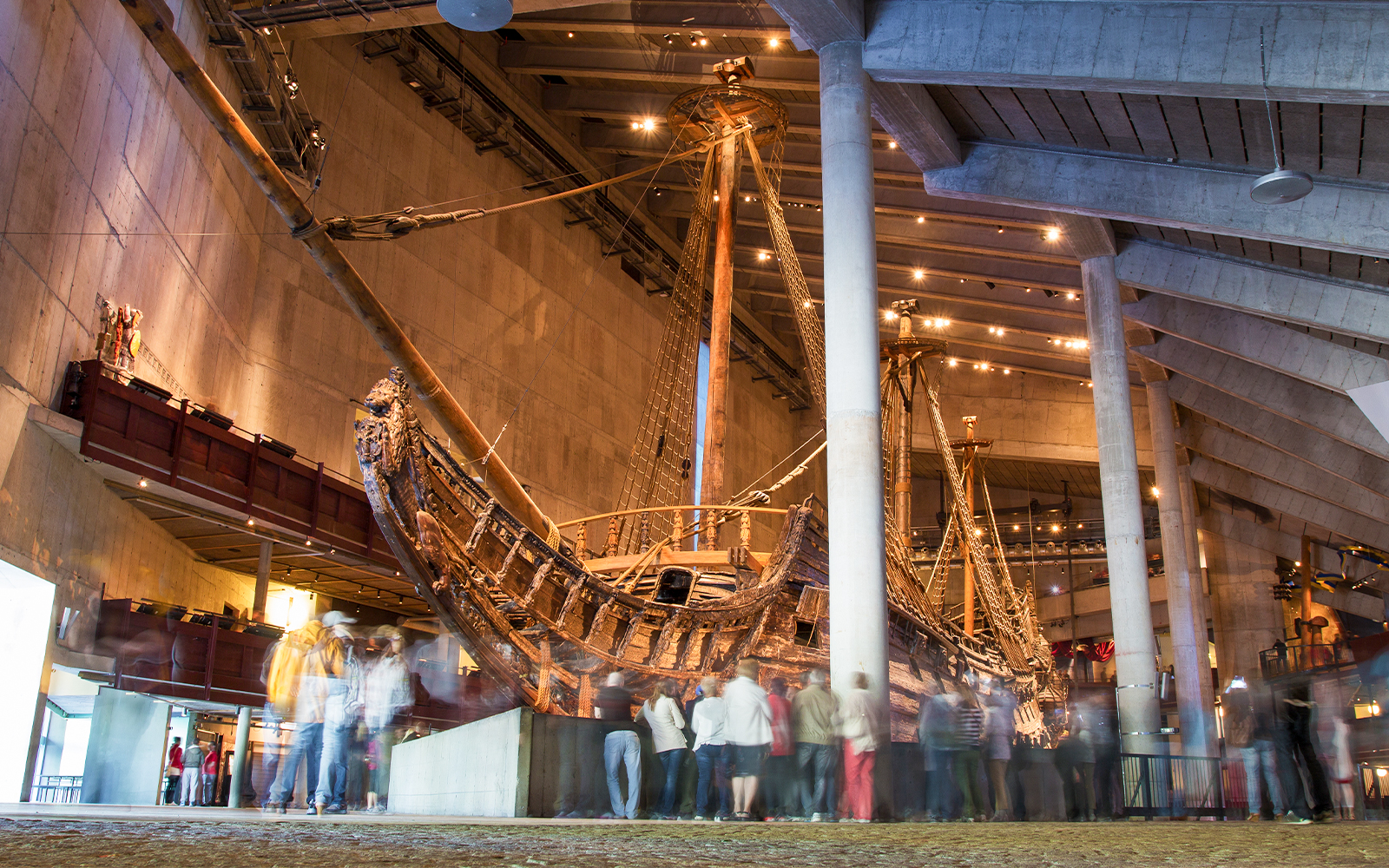 Vasa Museum ship exhibit with visitors in Stockholm.