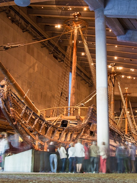 Vasa Museum ship exhibit with visitors in Stockholm.