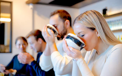 Group enjoying matcha-making experience in Tokyo.