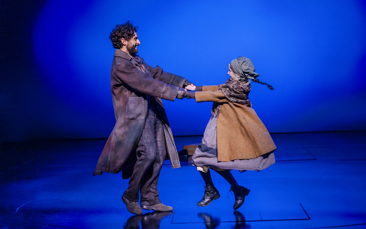 Performers dancing in a scene from the musical Ragtime.