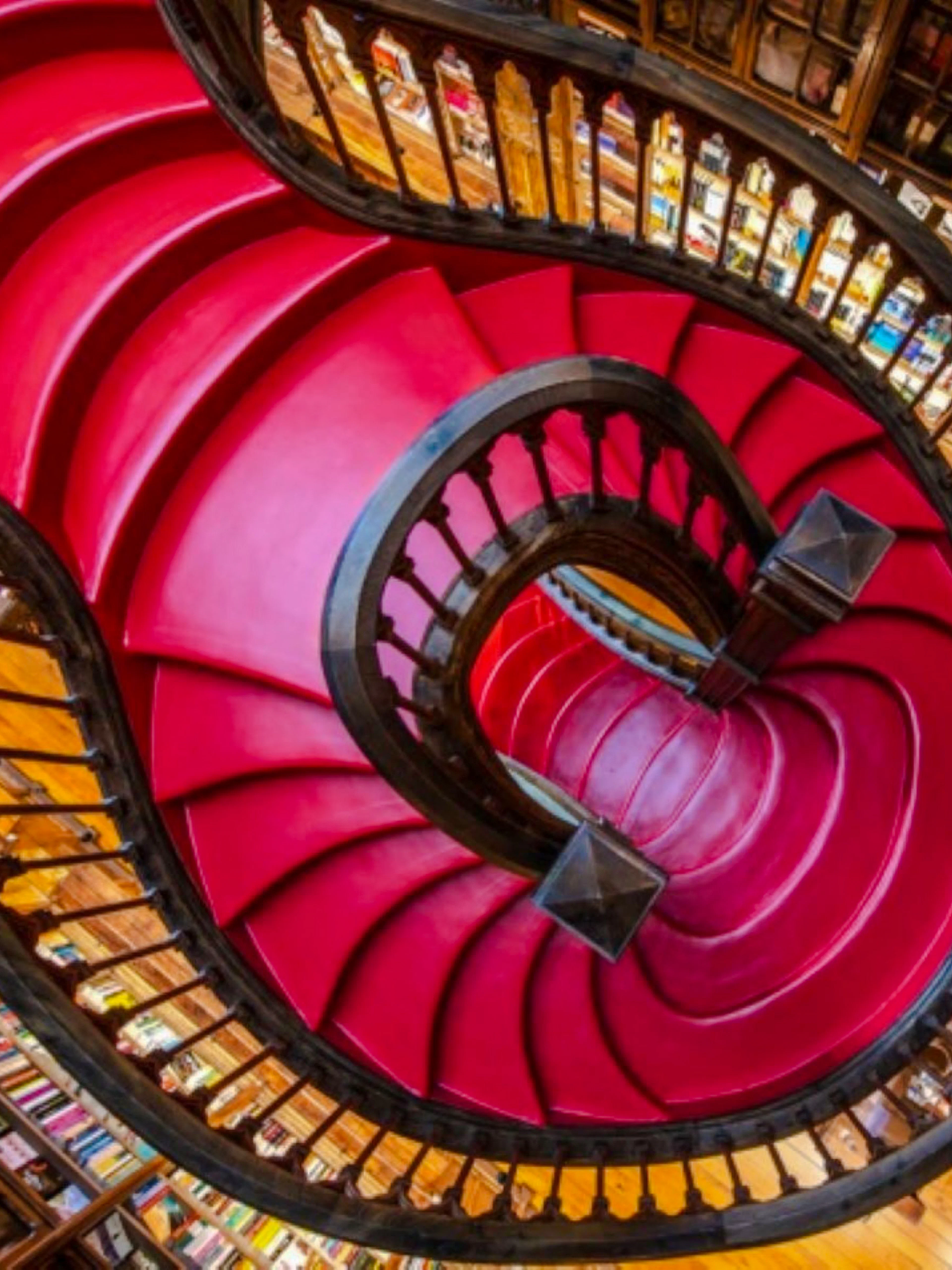 Spiral staircase inside Livraria Lello bookstore, Porto.