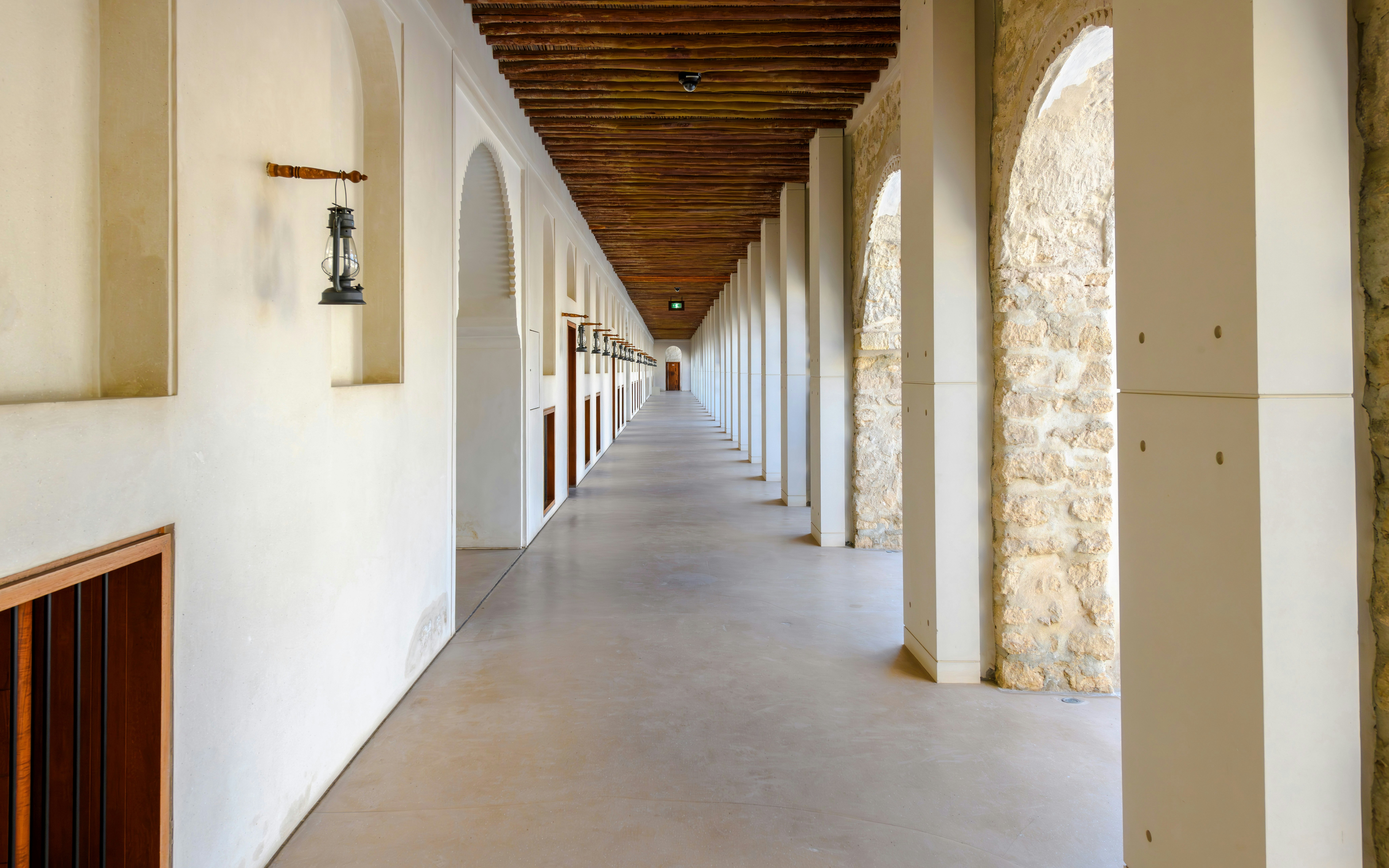 Interior hallway with arches in Qasr Al Hosn, 18th-century fortress, Abu Dhabi, UAE.