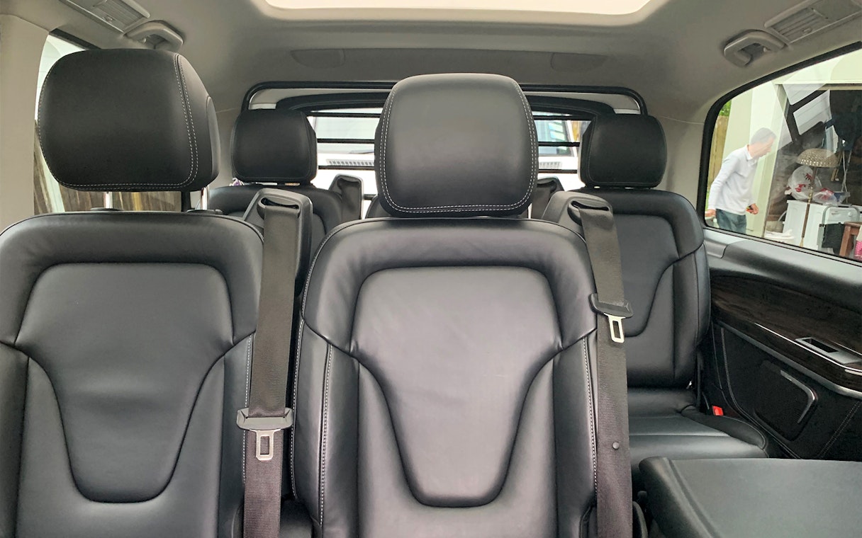 Luxury vehicle interior for Auckland to Hobbiton, Waitomo Caves, Te Puia transfer.