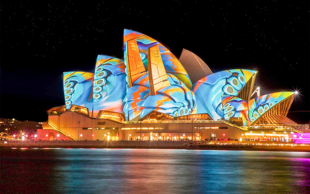 Sydney Opera House illuminated during Vivid Sydney Cruises.