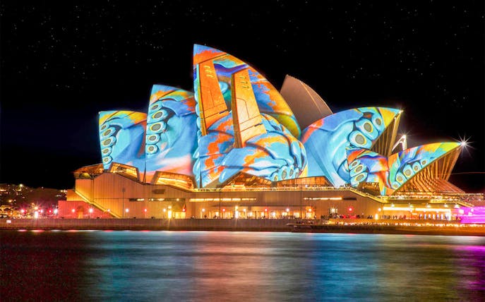 Sydney Opera House illuminated during Vivid Sydney Cruises.