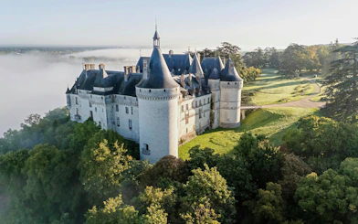 Domaine du Chaumont-sur-Loire Castle surrounded by lush gardens in Loire Valley.