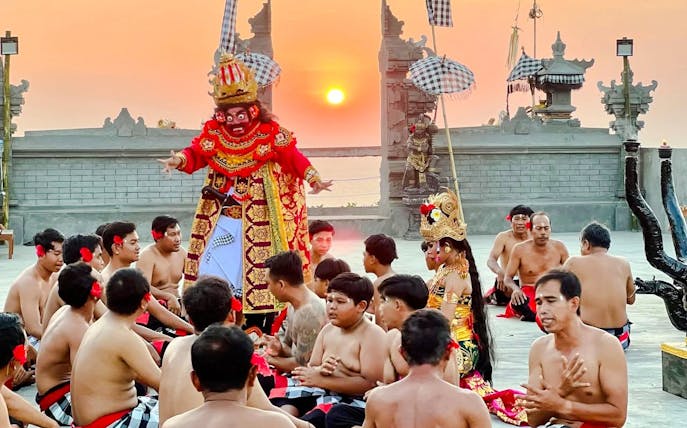 Kecak dance performance at Uluwatu Temple during sunset, Bali.