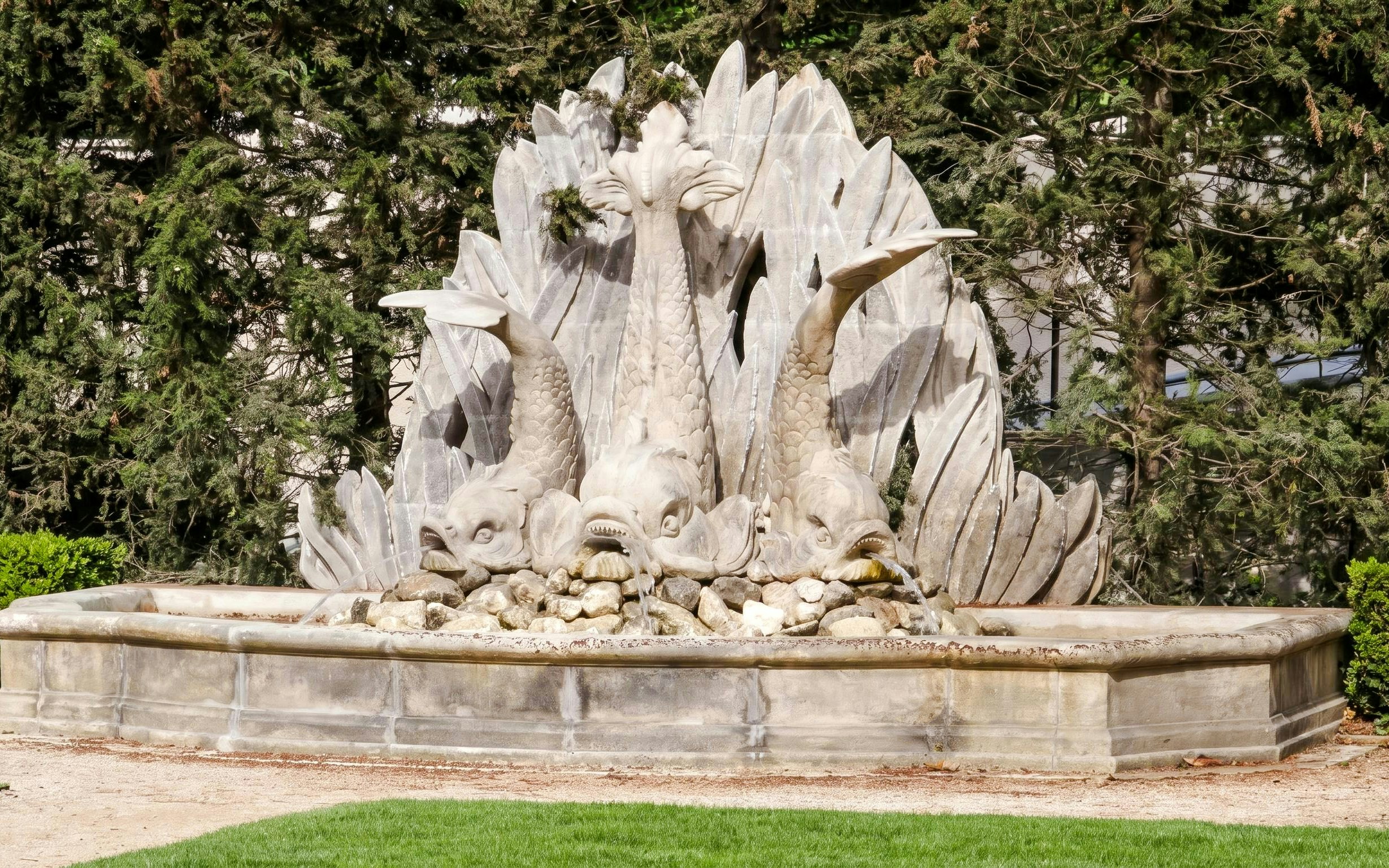 Fountain with dolphin sculptures at Caumont Centre d’Art, Aix-en-Provence.
