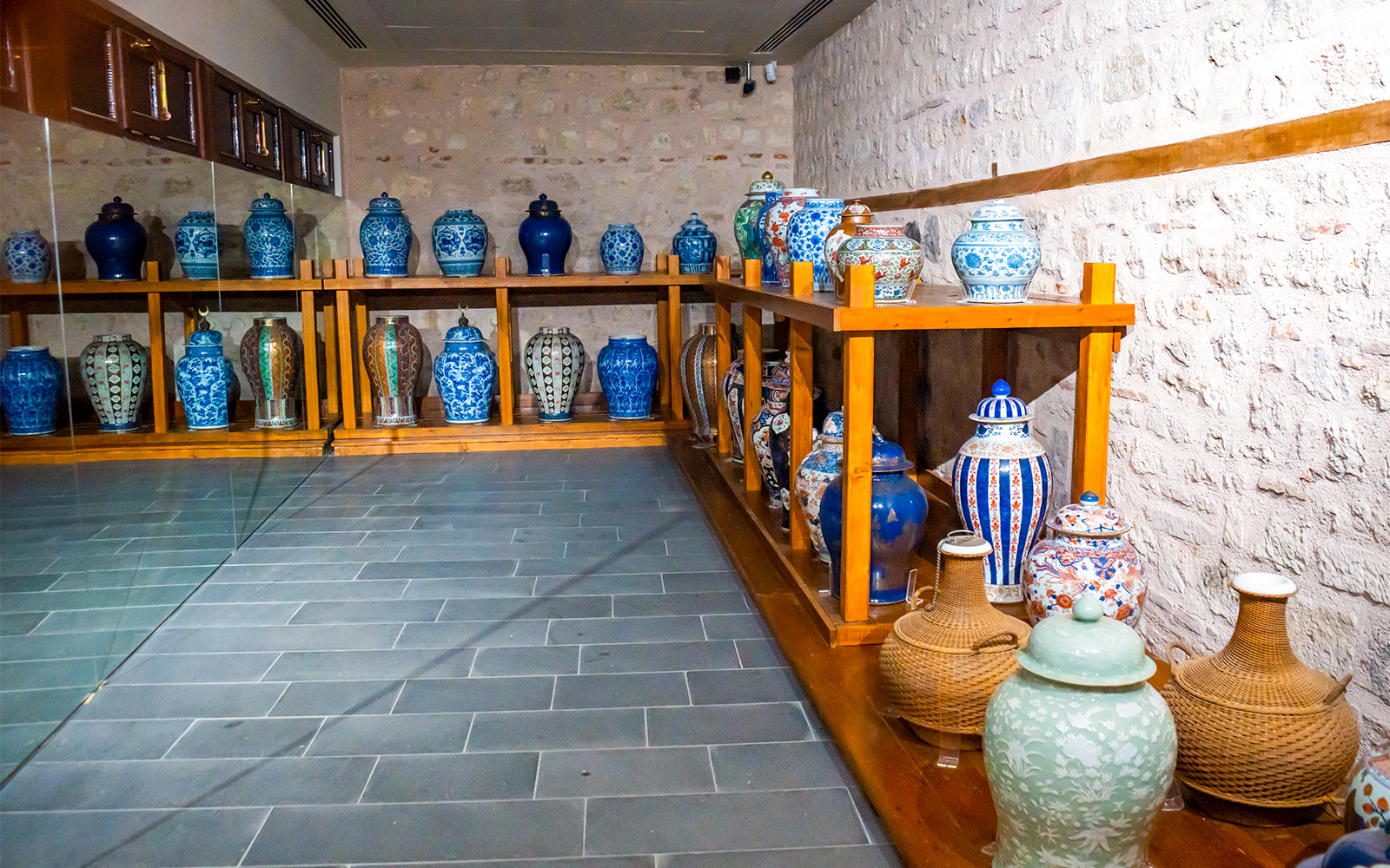Topkapi Palace kitchen with shelves of blue and white porcelain utensils.