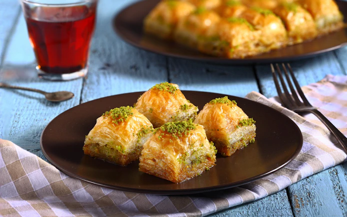 Baklava on a plate with tea, Athens in November.