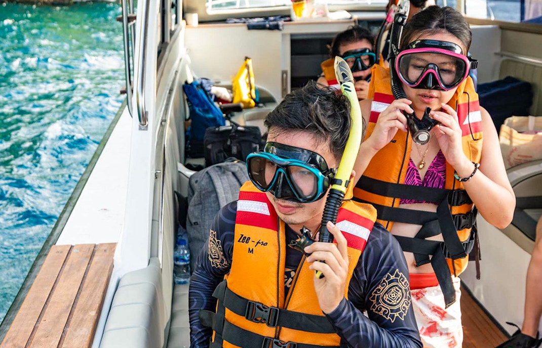 Nusa Penida & Mangrove Point Snorkelling Day Tour with tourists exploring vibrant underwater coral reefs and marine life in Bali