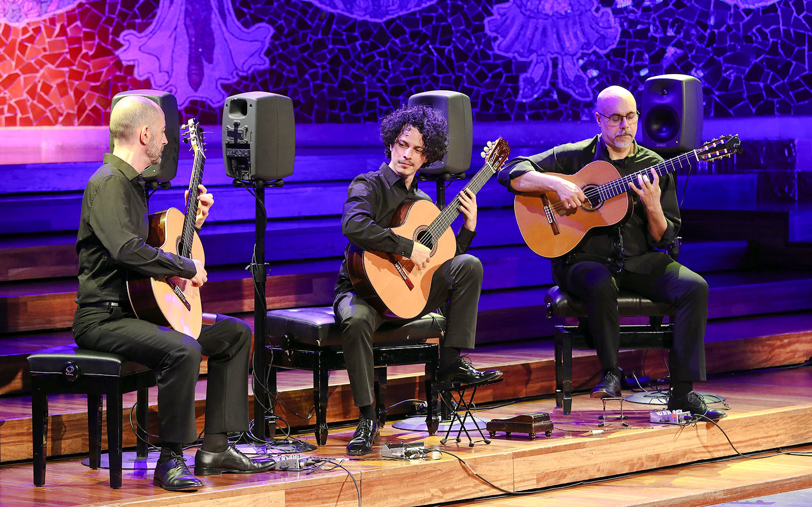 Flamenco guitarists performing at Palau de la Música, Barcelona.
