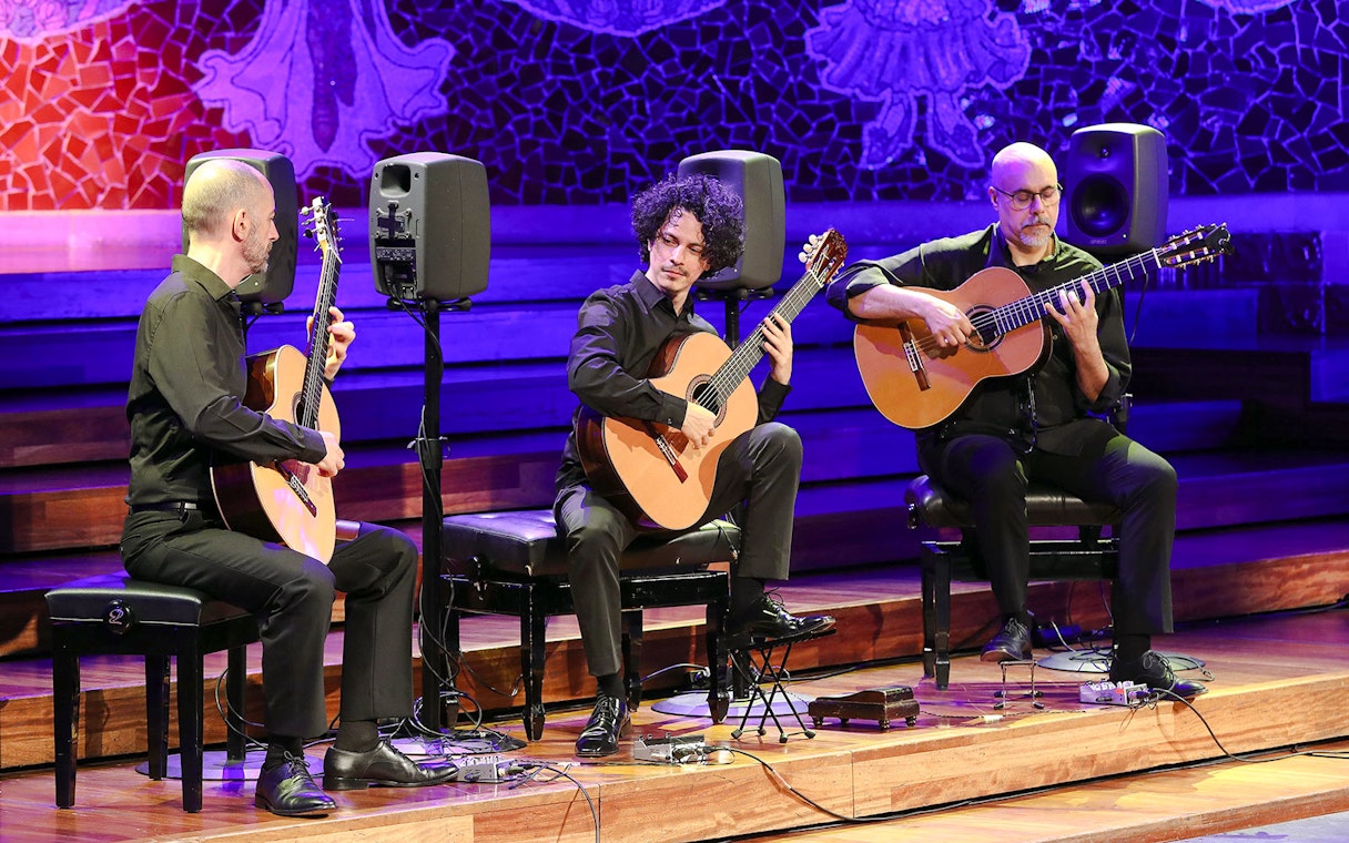 Flamenco guitarists performing at Palau de la Música, Barcelona.