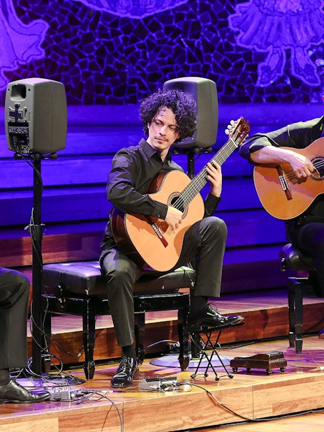 Flamenco guitarists performing at Palau de la Música, Barcelona.