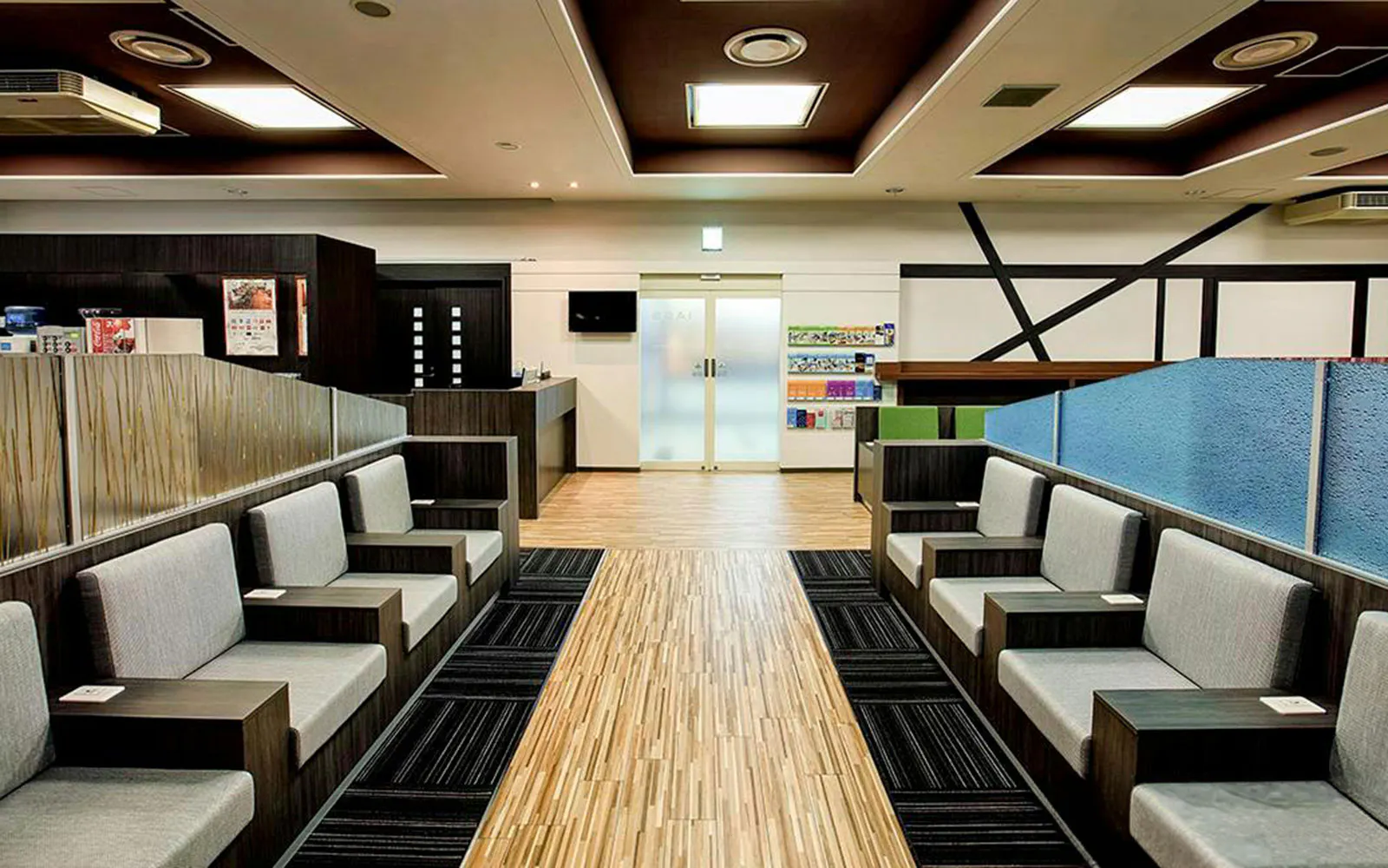 Waiting area seating at Narita International Airport Terminal 1 lounge.