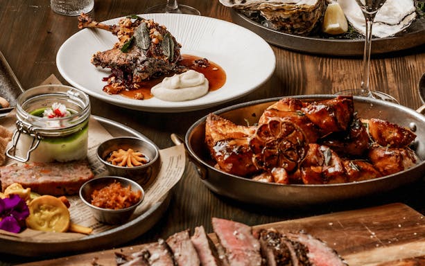 Roasted meats and sides at The Great Christmas Feast.