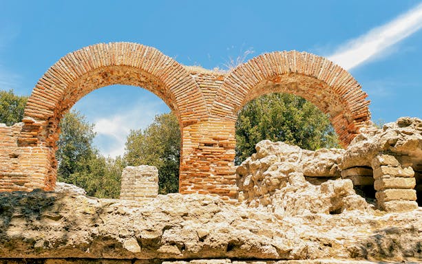 Ancient brick arches at the Archaeological Park of Cumae, Italy.