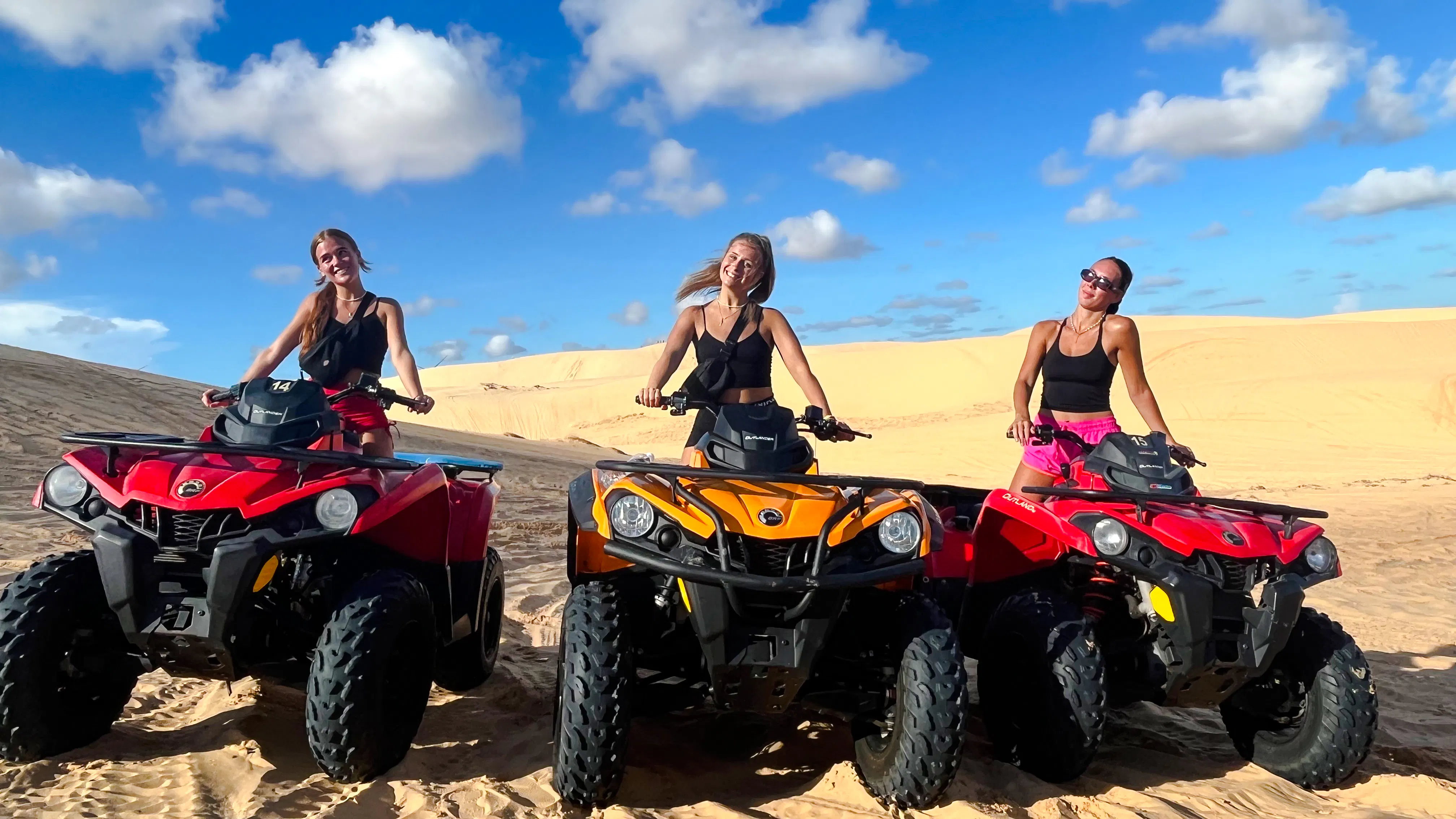 ATV riders on sand dunes during Mui Ne Jeep Tour, Ho Chi Minh City.