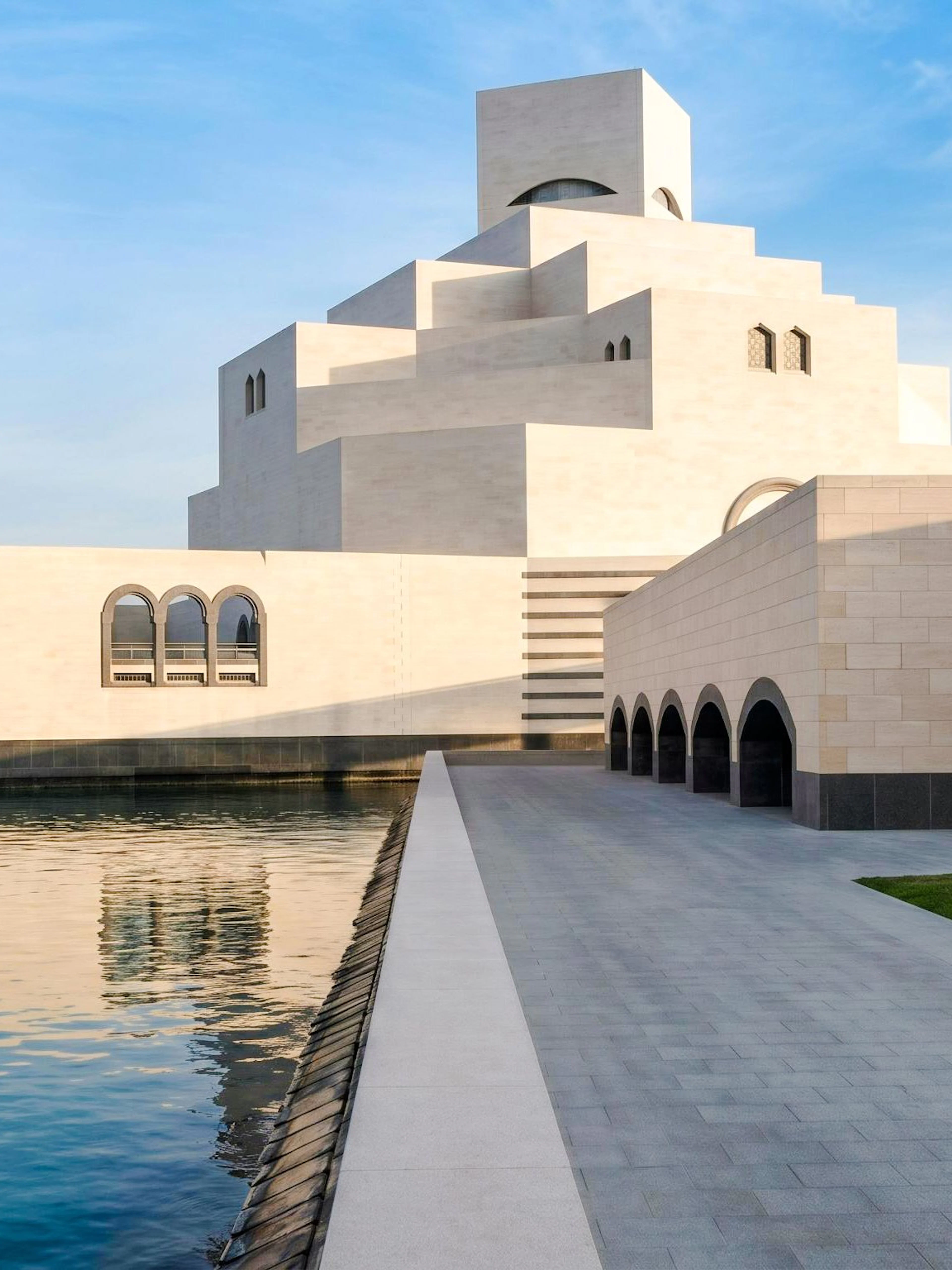 Museum of Islamic Art in Doha with waterfront view and modern architecture.