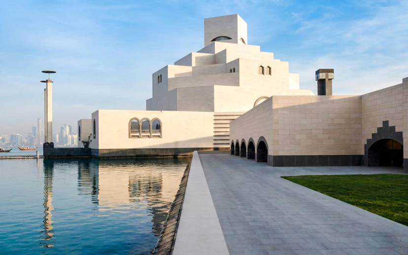 Museum of Islamic Art in Doha with waterfront view and modern architecture.
