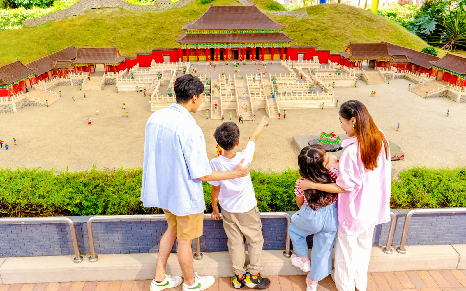 Family viewing LEGO Forbidden City model at LEGOLAND Malaysia Theme Park.