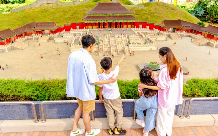 Family viewing LEGO Forbidden City model at LEGOLAND Malaysia Theme Park.