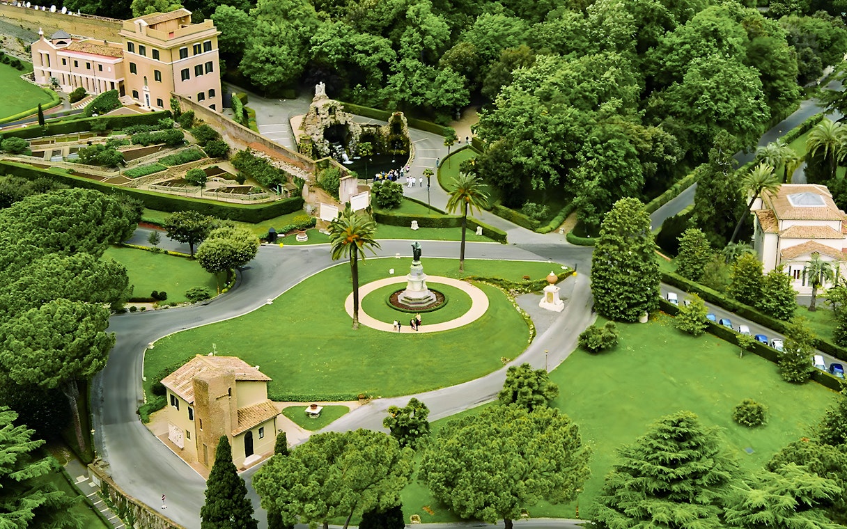 Vatican Gardens aerial view with pathways and statues, part of the Open Bus Tour with Museum Access.