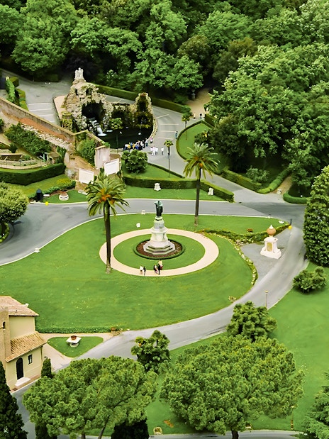 Vatican Gardens aerial view with pathways and statues, part of the Open Bus Tour with Museum Access.