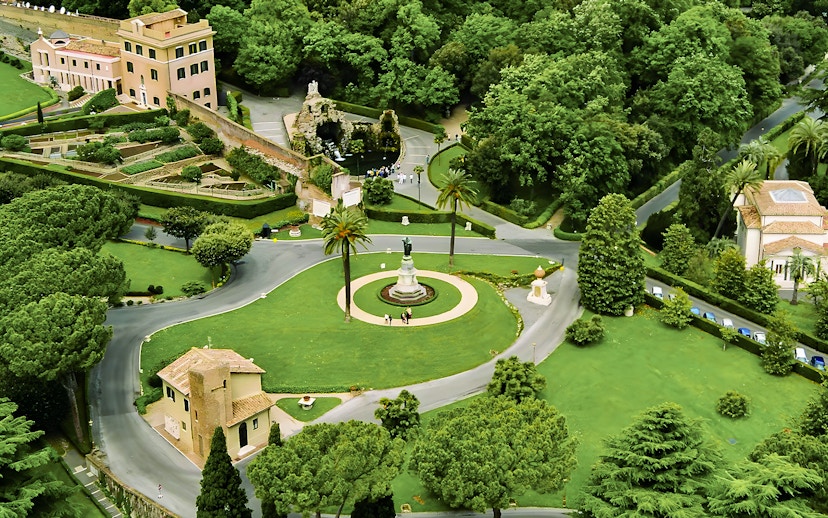 Vatican Gardens aerial view with pathways and statues, part of the Open Bus Tour with Museum Access.