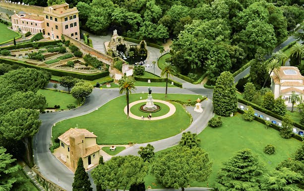 Vatican Gardens aerial view with pathways and statues, part of the Open Bus Tour with Museum Access.