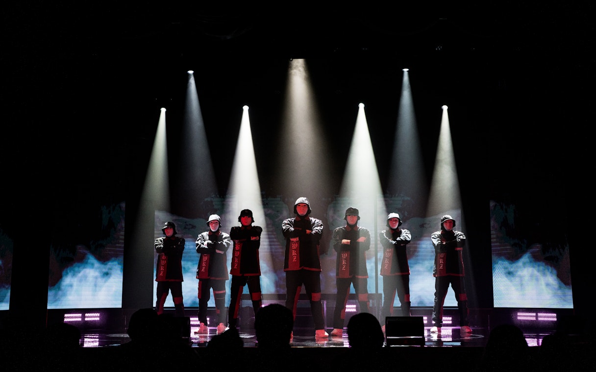 Dancers performing on stage at Jabbawockeez show in Las Vegas.
