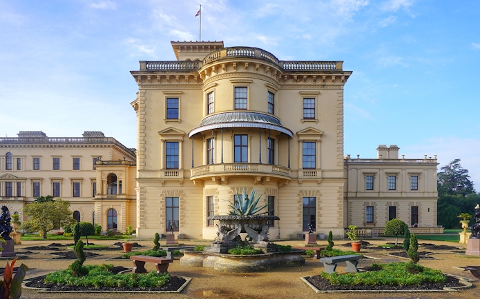Osborne House exterior with garden and fountain, Isle of Wight, England.