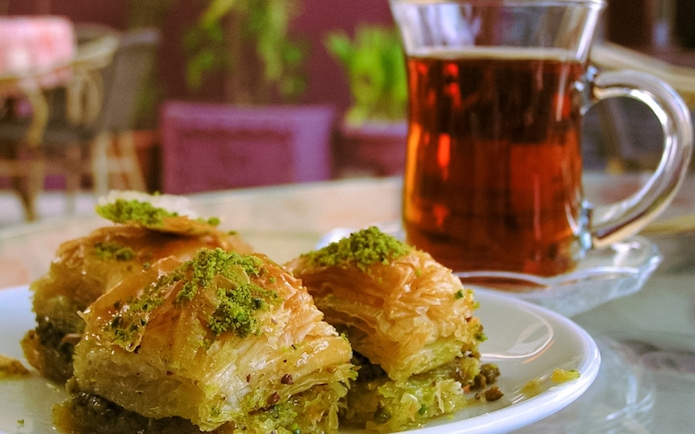 Baklava and tea served during Kravica Waterfalls & Mostar Day Trip.