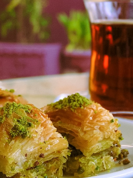 Baklava and tea served during Kravica Waterfalls & Mostar Day Trip.